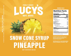 Lucy's syrup drizzled over shaved ice highlighting bright pineapple flavor