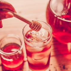 Luzianne pitcher of iced tea served over ice demonstrating refreshing chilled drink