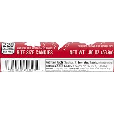 LYZA'S SWEETS & TREATS tube pouring minis into hand, convenient on-the-go sharing