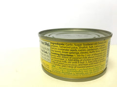MAESRI Masaman paste in bowl showing warm spice tones and smooth consistency