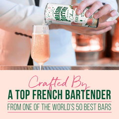 Maison Perrier flute with peach garnish in lifestyle setting, suggests celebratory elegance