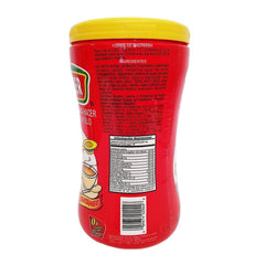Malher chicken bouillon in soup ladle over pot, demonstrates quick rich flavor enhancement