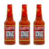 Marie Sharp's BEWARE front packaging showing bold red habanero sauce and brand badge