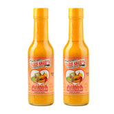 Marie Sharp's front bottle shot showing label and vibrant mango color for shelf appeal