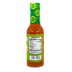 Marie Sharp's pouring over chicken glaze illustrating savory-sweet finishing benefit