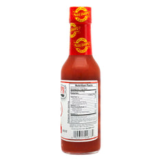 Close-up of Marie Sharp's sauce texture, highlighting natural ingredients and balanced heat