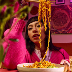 Maruchan Sweet Cheese noodles close-up showing creamy sauce coating
