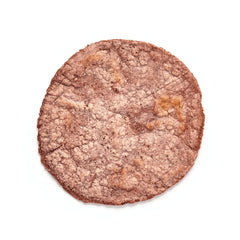Masienda red corn tortillas on comal showing even browning