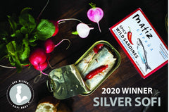 Matiz olive oil drizzle over sardines emphasizing preserved moistness and taste