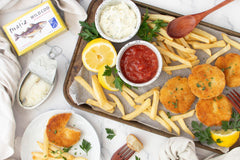 Matiz open tin top-down view revealing tender cod in olive oil, ready to eat