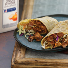 McCormick Culinary powder stirred into sauce providing smooth flavor
