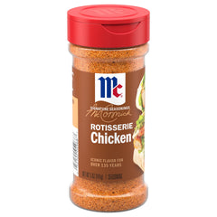 McCormick seasoning pouring onto chicken to add rotisserie-style flavor