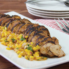 McCormick seasoning sprinkled on browned ground beef to boost savory flavor