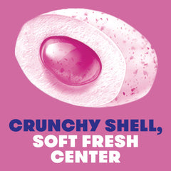 Cross-section of Mentos gum revealing soft center and vibrant berry taste