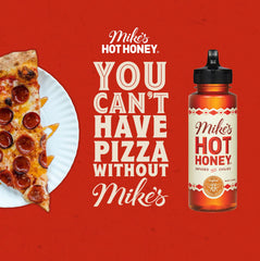 Mike's Hot Honey close-up texture with chili flecks highlighting flavor intensity