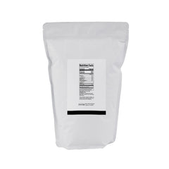 Minimalist whole milk powder close-up of powder texture, brand clarity and scoopability benefit