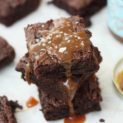 Miss Jones Baking brownies in pan freshly baked delivering gooey, shareable benefit