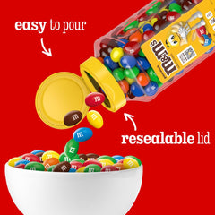 M&M's peanut jar in hand to show size and travel-friendly portioning benefit