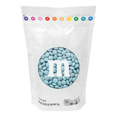 M&M'S WORLD front packaging showing 2 lb resealable bag and light blue candies
