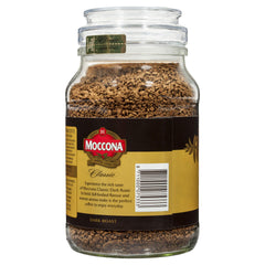 Prepared cup of Moccona dark roast in kitchen setting, showcasing bold flavor
