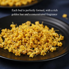 MOCKRAND brewed osmanthus tea in a clear cup showcasing golden color and clarity