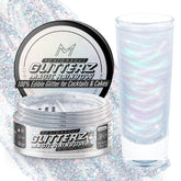 MONÉGASQUE front jar view showing shimmer and 10g size for clear presentation