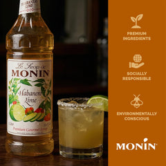 Monin Habanero Lime bottle beside measuring jigger to show scale and portion control benefit
