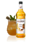 Monin bottle front label showing honey syrup and clear branding benefit
