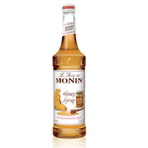 Monin bottle front view showing label and 750 mL size, clear brand presentation and convenience
