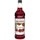Monin pomegranate syrup bottle front view showing label and 1 L size for reliable flavoring