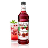 Monin bottle front label showing pomegranate flavor and clear benefits