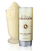 Monin white chocolate sauce front bottle showing branding and creamy appeal