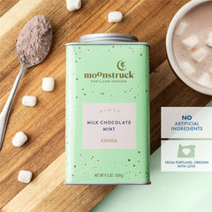 Moonstruck mint hot cocoa served in mug with steam, demonstrating cozy enjoyment