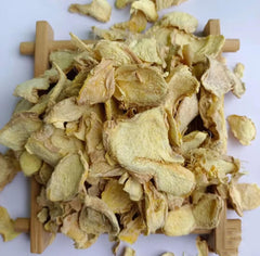 MOORCHOCO ginger slices in a wooden bowl ready for cooking to add bold flavor to recipes