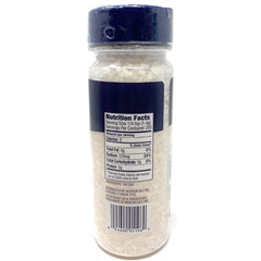 Morton extra coarse sea salt being poured into a grinder demonstrating quick refill