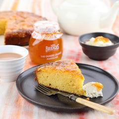 Mrs Bridges spread on toast in kitchen adding bright citrus flavor
