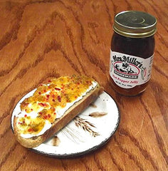 Mrs. Miller's jelly spooned over cream cheese on crackers creating quick appetizer