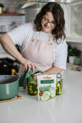 Mrs. Wages served next to a burger demonstrating how sweet pickles enhance sandwiches and meals