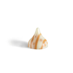 Munchique in a candy bowl on a holiday table adding seasonal warmth and visual appeal