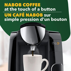 NABOB hazelnut coffee being poured into a mug illustrating aroma and warmth