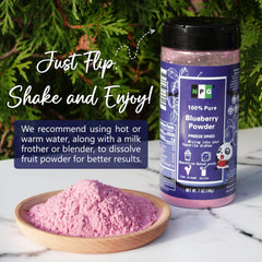 Natural Plus Green powder closeup showing fine freeze‑dried texture and strong blueberry color