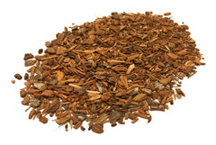 Naturegrail close-up of cut cinchona bark texture and color, highlighting quality and grind suitability