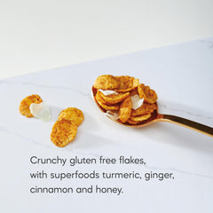 Nature's Path close-up of crunchy turmeric-coated flakes highlighting texture and color