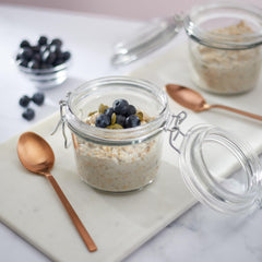 Nature's Path oatmeal served with fruit and milk illustrating a flavorful, customizable morning meal