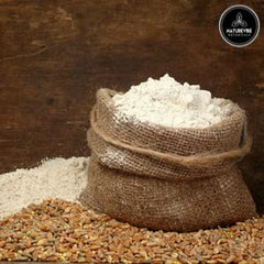 Naturevibe Botanicals flour in measuring cup illustrating easy portioning