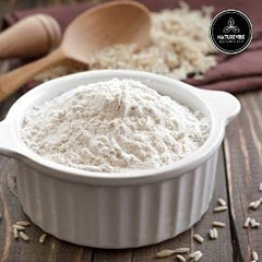Naturevibe Botanicals spoon scooping finely milled flour highlighting silky particle size