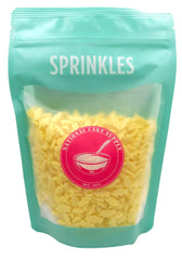 NCS sprinkles topping a yellow-frosted cupcake for instant theme