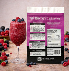 Nectar of the Vine raspberry slushy in glass garnished with fresh raspberries
