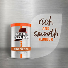 Nescafé Azera Americano open jar with instant granules and ground particles, easy-to-scoop texture