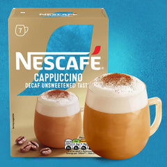 Nescafe cappuccino in a mug on a table, creamy foam and relaxed enjoyment